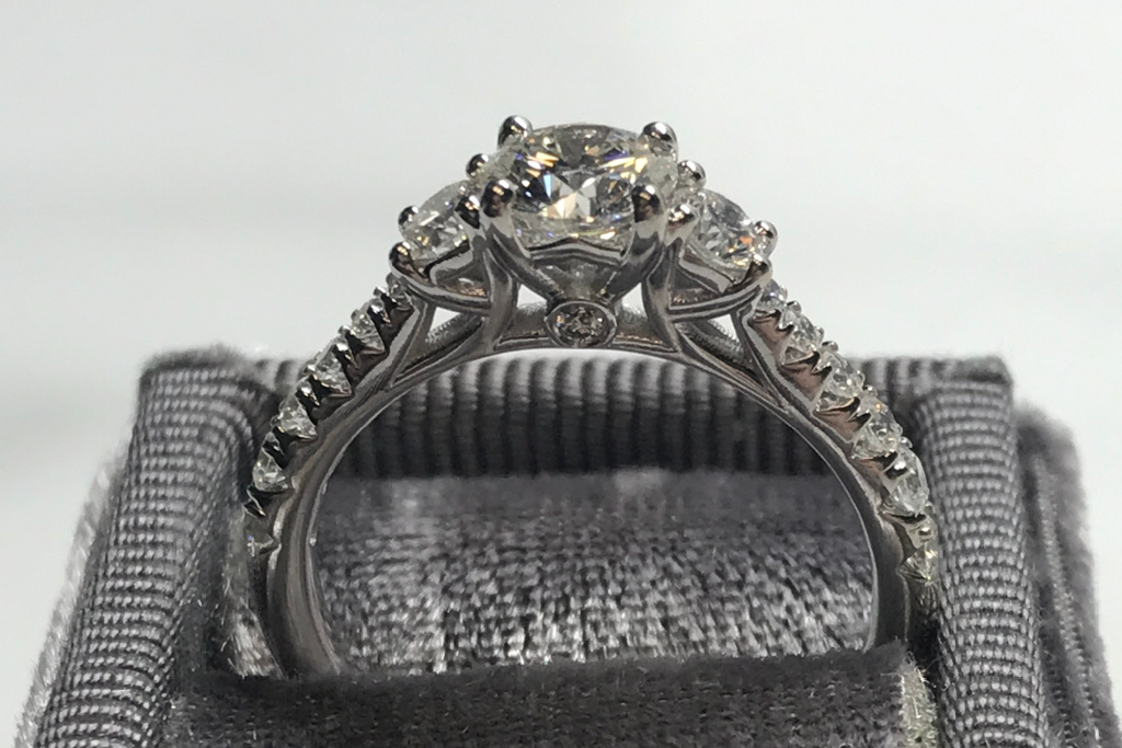 three stone cathedral ring with french set accents