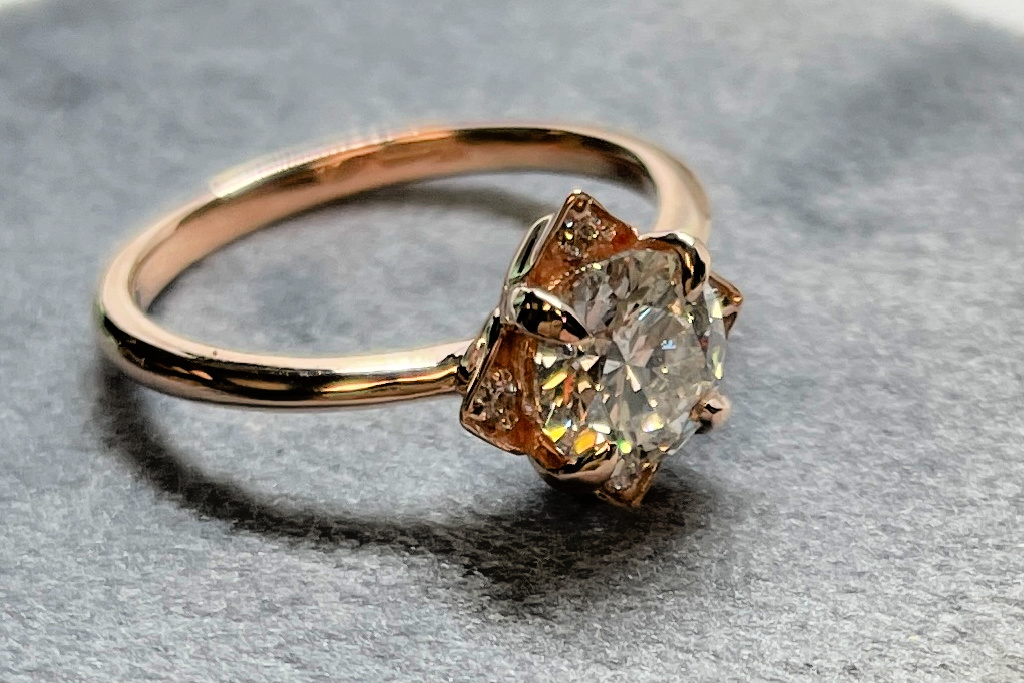 Rose gold rose inspired engagement ring