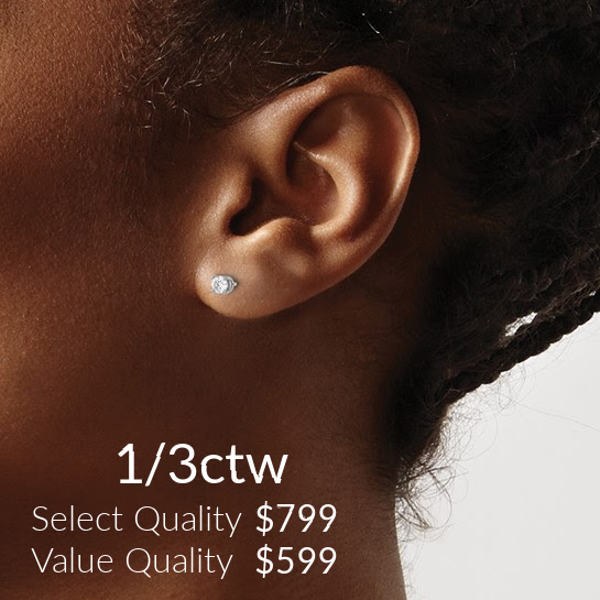 1/3ctw diamond stud earrings on model