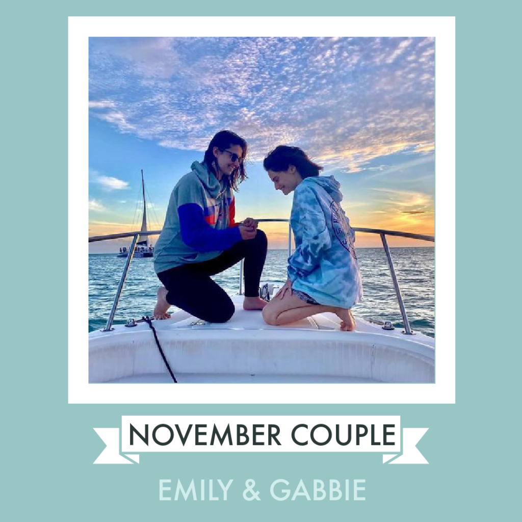 November couple of the month winner: Emily & Gabbie proposal photo on a boat.