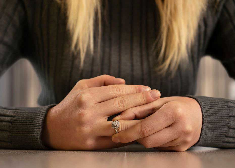 Sophisticated Women's Hand Flaunts Engagement Ring